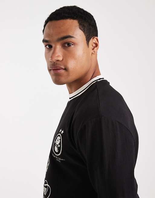 ASOS DESIGN Relaxed Long Sleeve T-shirt With Tipping Detail And Sports Graphic In Black