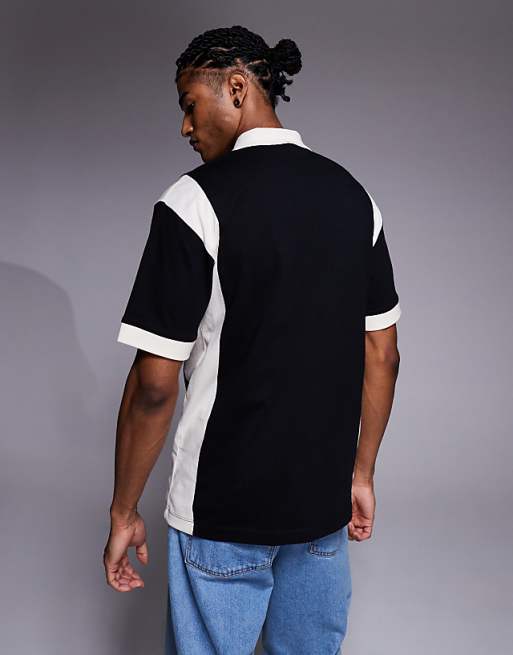 ASOS DESIGN Relaxed Polo With City Graphic In Black With Panelling