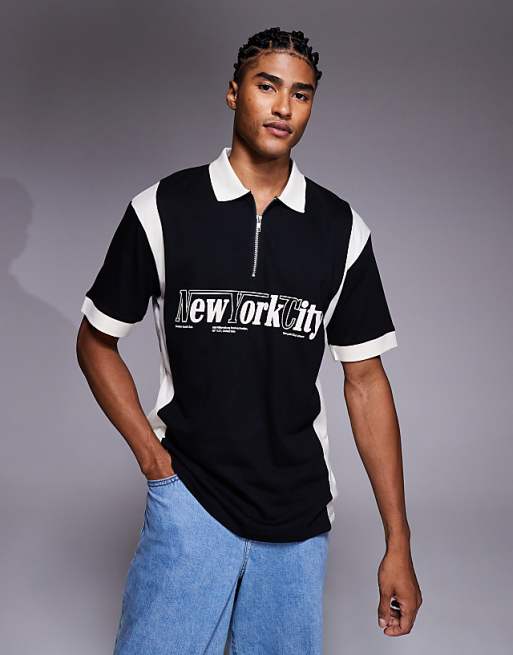 ASOS DESIGN relaxed polo with city graphic in black with panelling