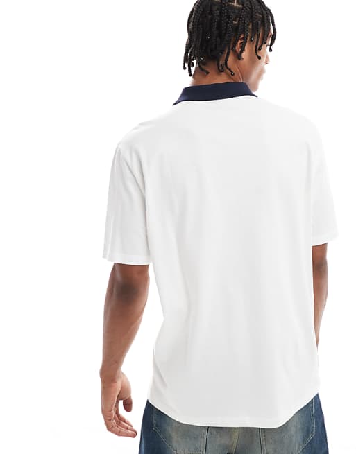 ASOS DESIGN Relaxed Polo With Front Golf Graphic In White