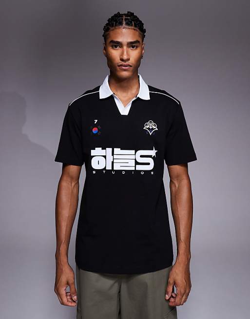 ASOS DESIGN relaxed polo with piping detail and sports graphic in black