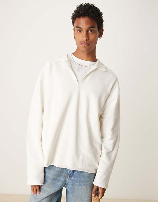 ASOS DESIGN relaxed polo with raw hem in white