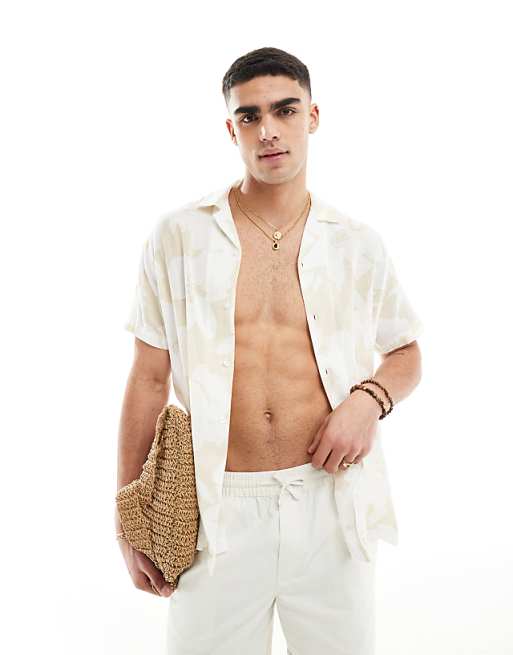 ASOS DESIGN relaxed revere shirt in stone floral print