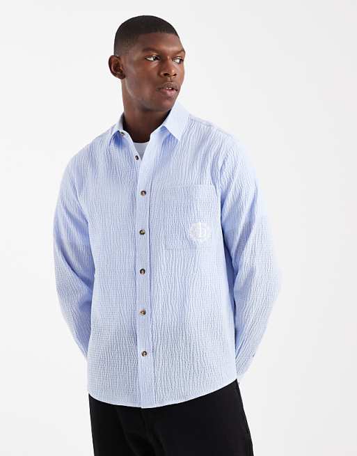 ASOS DESIGN relaxed seersucker shirt with embroidery in blue