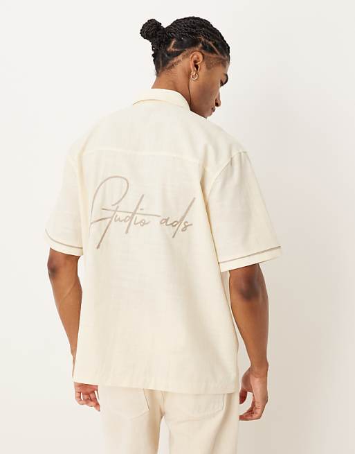 ASOS DESIGN relaxed shirt with back print in beige