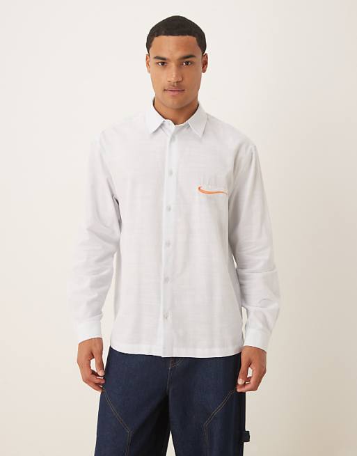 ASOS DESIGN relaxed shirt with chest embroidery in blue