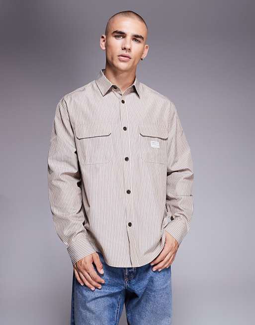 ASOS DESIGN relaxed stripe shirt with workwear badge detail in brown stripe