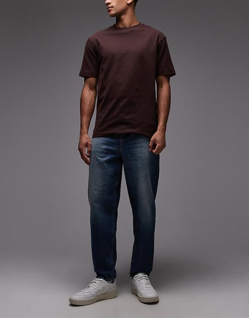 ASOS DESIGN relaxed tapered jeans in indigo
