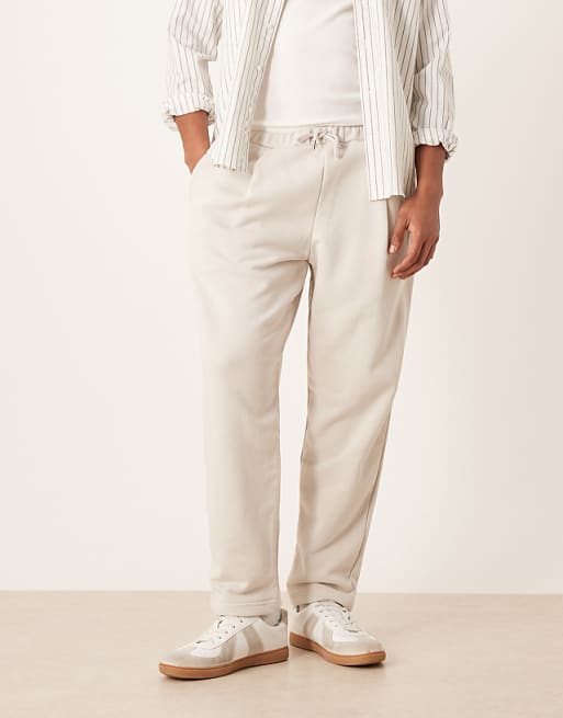 ASOS DESIGN Relaxed Tapered Joggers With Pleats In Stone