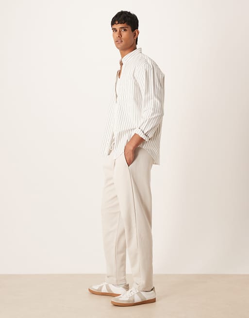ASOS DESIGN Relaxed Tapered Joggers With Pleats In Stone
