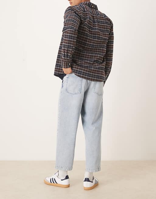 ASOS DESIGN Relaxed Tapered Pleated Jeans In Bleach Wash Denim