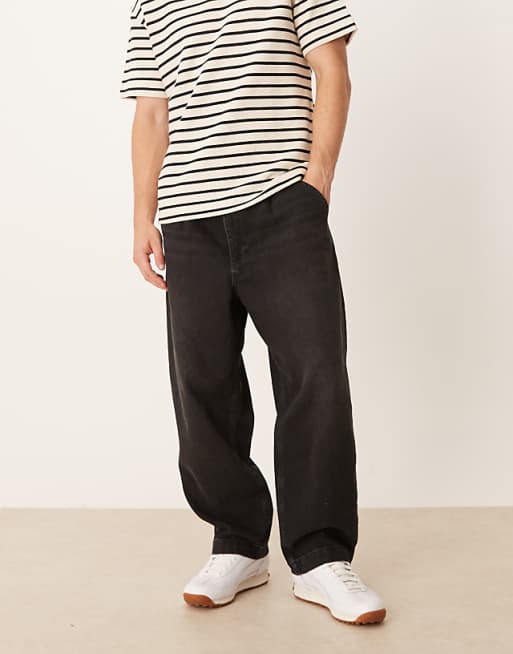 ASOS DESIGN relaxed tapered pleated jeans in washed black