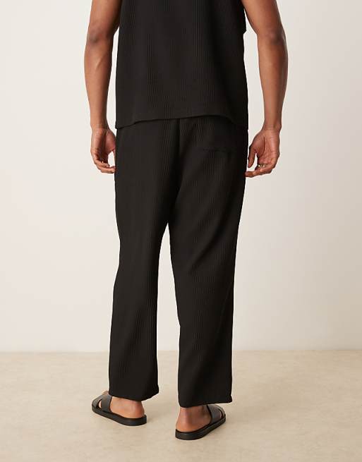 ASOS DESIGN Relaxed Tapered Plisse Joggers In Black