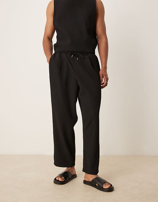 ASOS DESIGN relaxed tapered plisse joggers in black