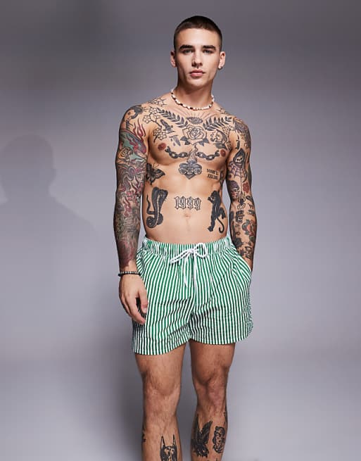 ASOS DESIGN seersucker stripe swim shorts in short length in green