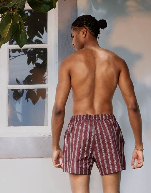 ASOS DESIGN Seersucker Swim Shorts In Short Length In Burgundy Stripe