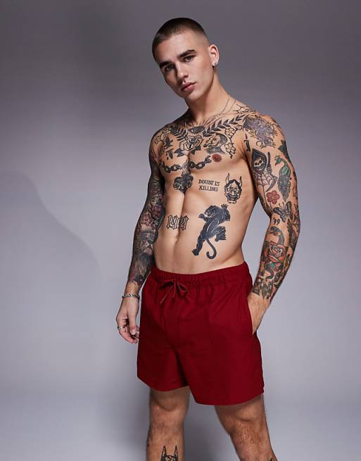ASOS DESIGN seersucker swim shorts in short length in burgundy