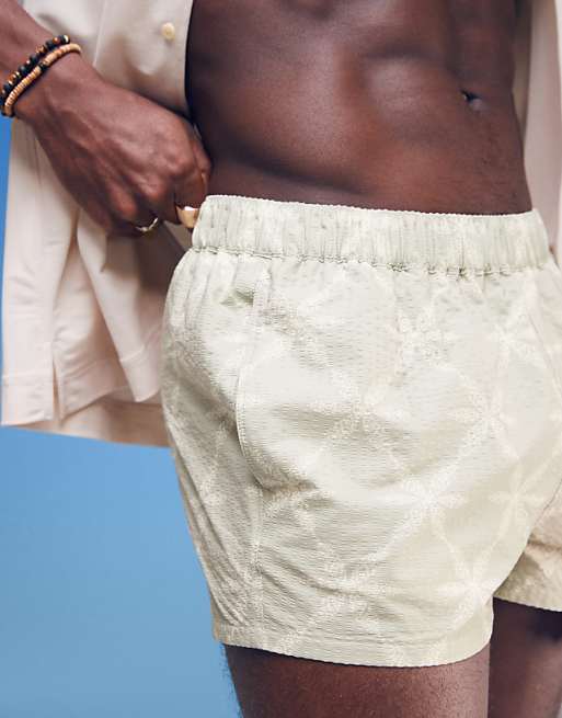 ASOS DESIGN Seersucker Swim Shorts In Super Short Length With Tonal Floral Print In Sage