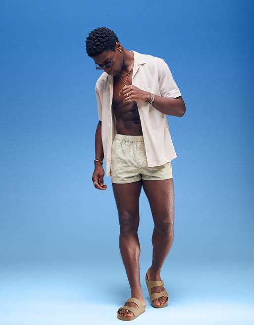 ASOS DESIGN Seersucker Swim Shorts In Super Short Length With Tonal Floral Print In Sage