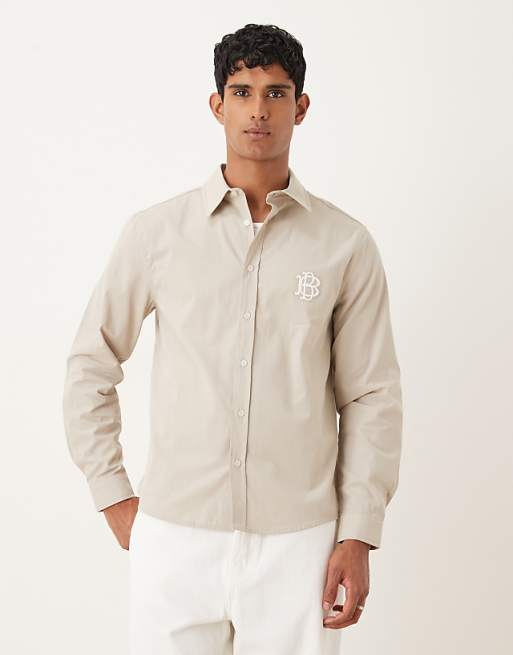 ASOS DESIGN shirt with chest embroidery in buttermilk cotton poplin