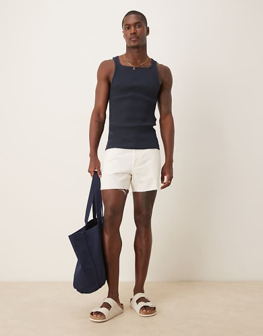 ASOS DESIGN shorter length slim denim shorts with rip detail in white