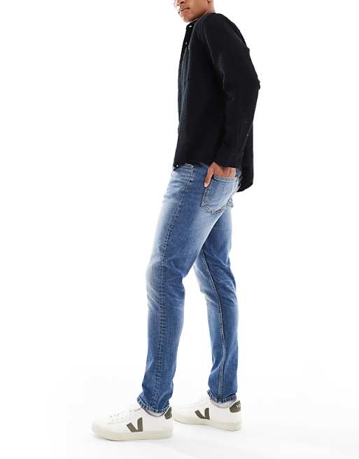 ASOS DESIGN Skinny Jeans In Mid Wash Blue