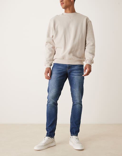 ASOS DESIGN slim fit jeans in indigo