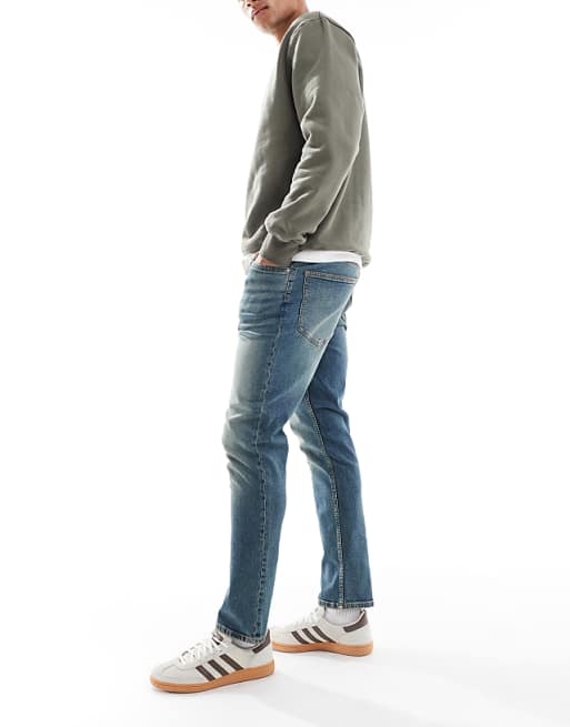 ASOS DESIGN Slim Jeans In Mid Wash Blue With Tint