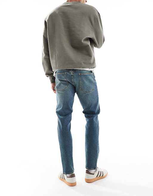 ASOS DESIGN Slim Jeans In Mid Wash Blue With Tint