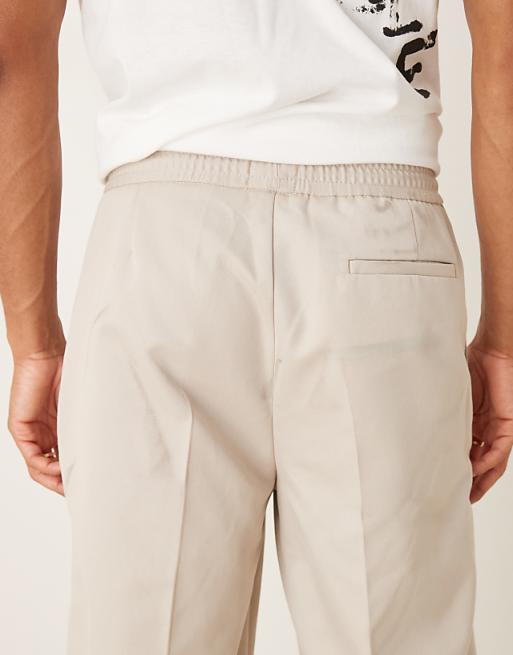 ASOS DESIGN Straight Leg Trouser With Elasticated Waist Band And Pintucks In Stone
