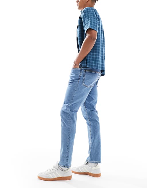 ASOS DESIGN Stretch Slim Jeans In Flat Mid Wash Blue