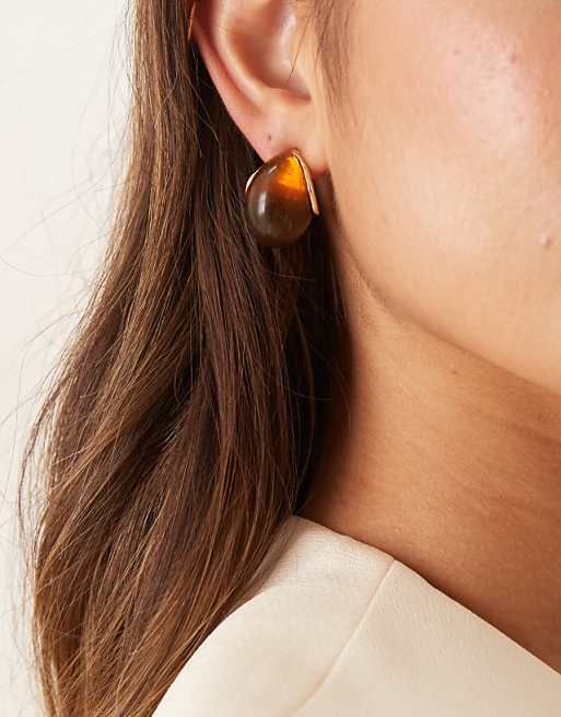 ASOS DESIGN stud earrings with burgundy resin in gold tone