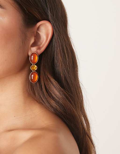 ASOS DESIGN stud earrings with faux stone-set pendants in amber tones
