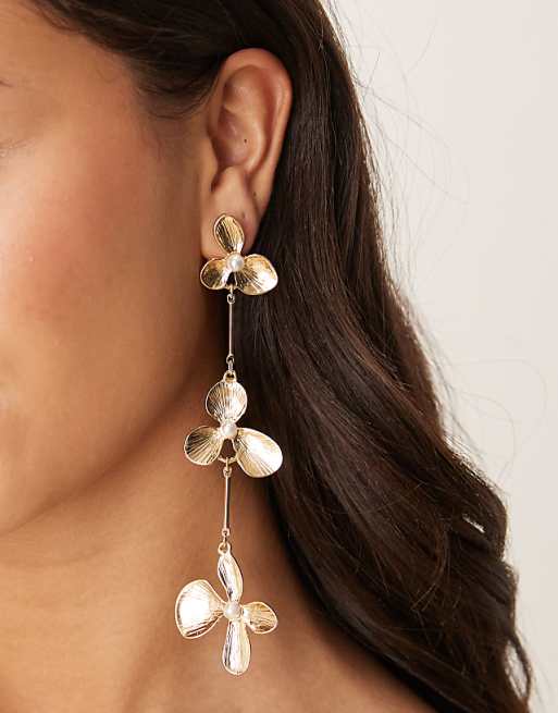ASOS DESIGN stud earrings with triple floral drops in gold tone