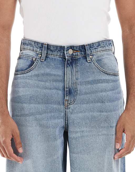 ASOS DESIGN Super Baggy Fit Jeans In Mid Wash Blue With Tint
