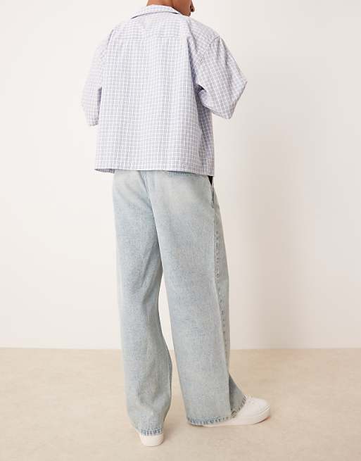 ASOS DESIGN Super Baggy Jeans With Front Pleats In Light Wash Blue