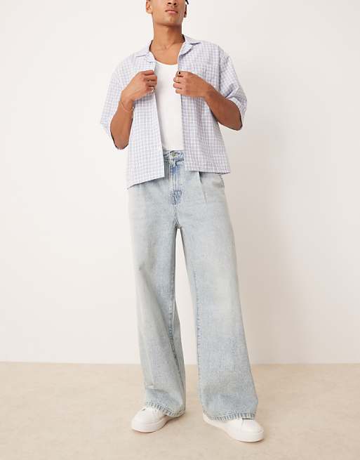 ASOS DESIGN super baggy jeans with front pleats in light wash blue