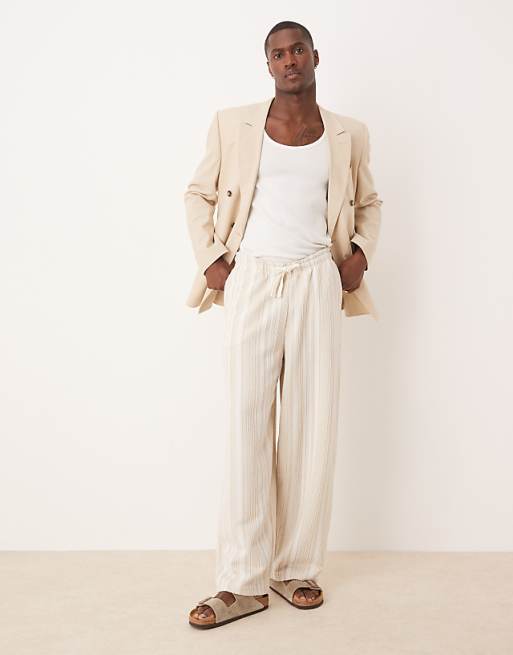 ASOS DESIGN super baggy jogger with stripes in beige