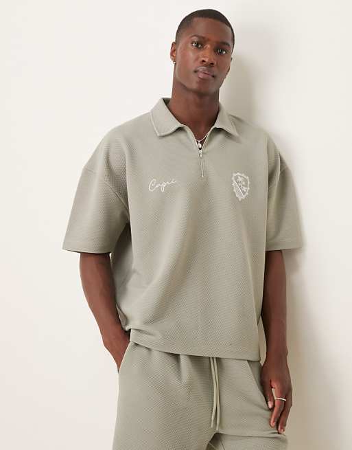 ASOS DESIGN super heavyweight boxy oversized polo with dropped shoulder and chest embroidery in khaki texture