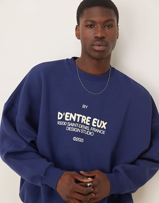 ASOS DESIGN sweatshirt with chest print in navy