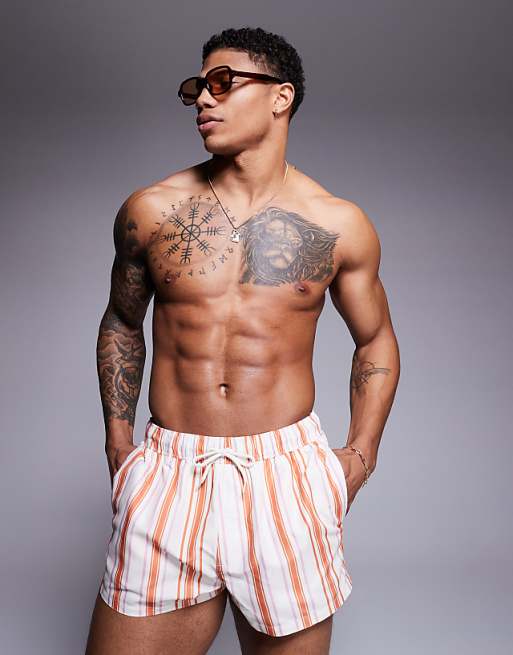 ASOS DESIGN swim short in super short length in white and orange stripe