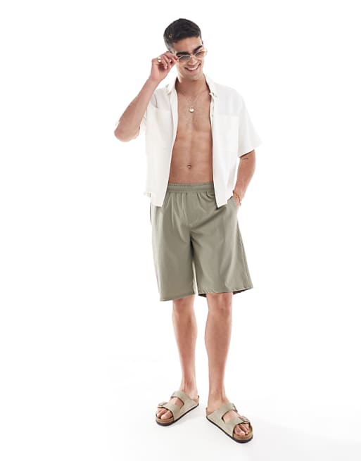 ASOS DESIGN swim shorts in long length in sage green