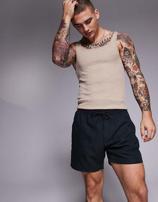 ASOS DESIGN swim shorts in mid length in black