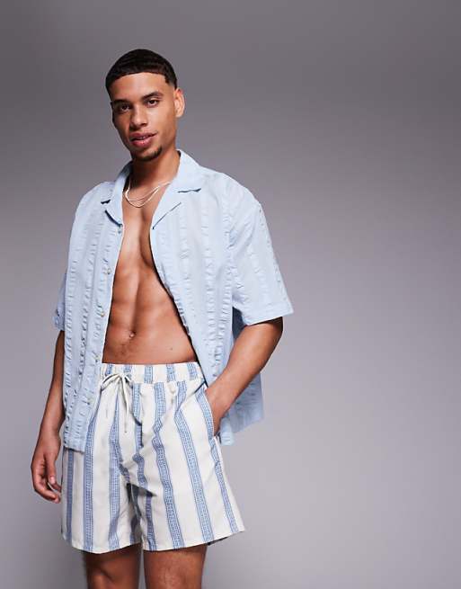 ASOS DESIGN swim shorts in mid length in blue stripe