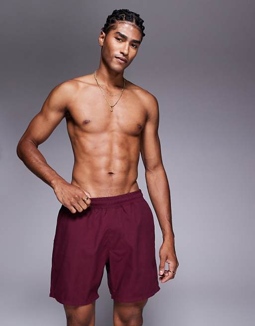 ASOS DESIGN swim shorts in mid length in burgundy