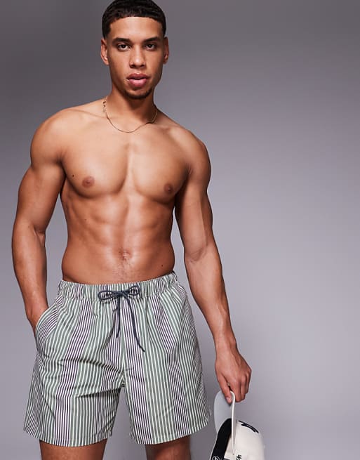 ASOS DESIGN swim shorts in mid length in green stripe