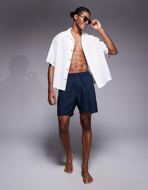 ASOS DESIGN Swim Shorts In Mid Length In Navy