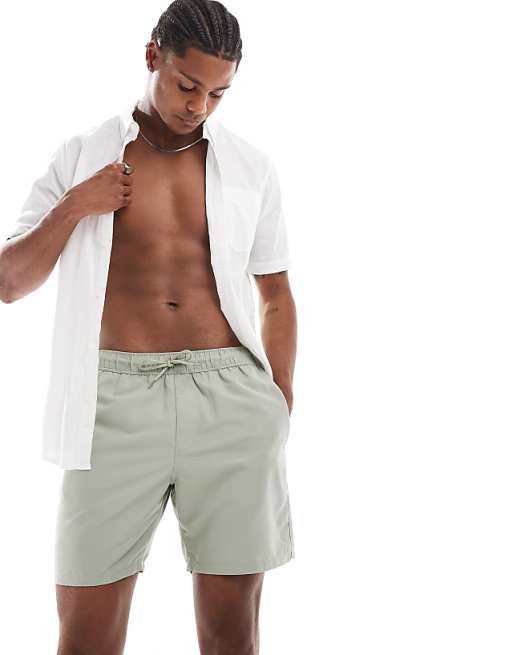 ASOS DESIGN swim shorts in mid length in sage