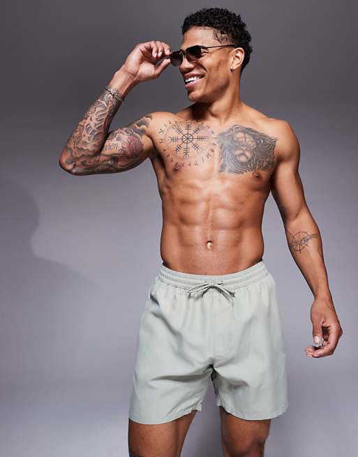 ASOS DESIGN swim shorts in mid length in sage