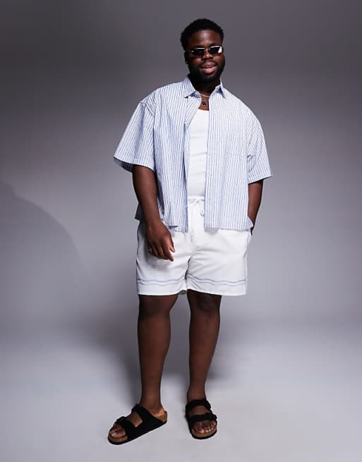ASOS DESIGN Swim Shorts In Mid Length In Stone With Border Print